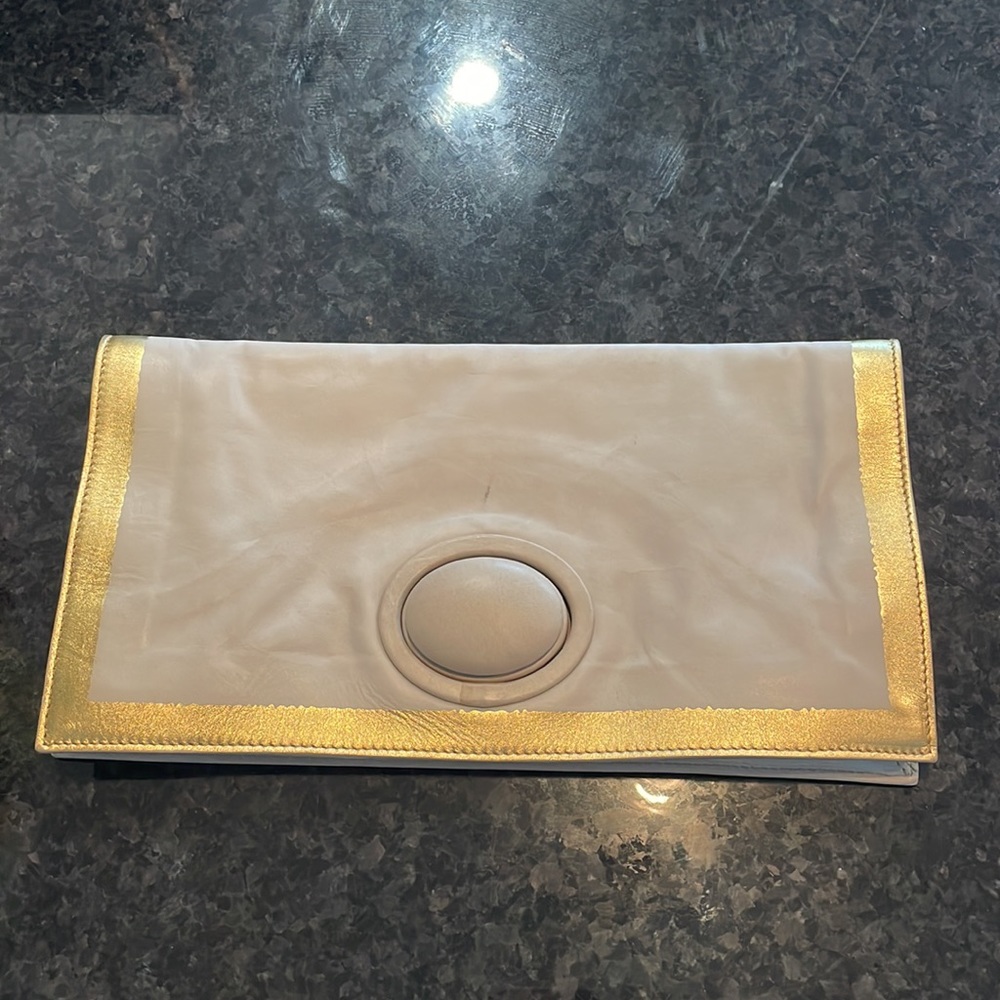 Bottega Veneta raw leather twist lock clutch